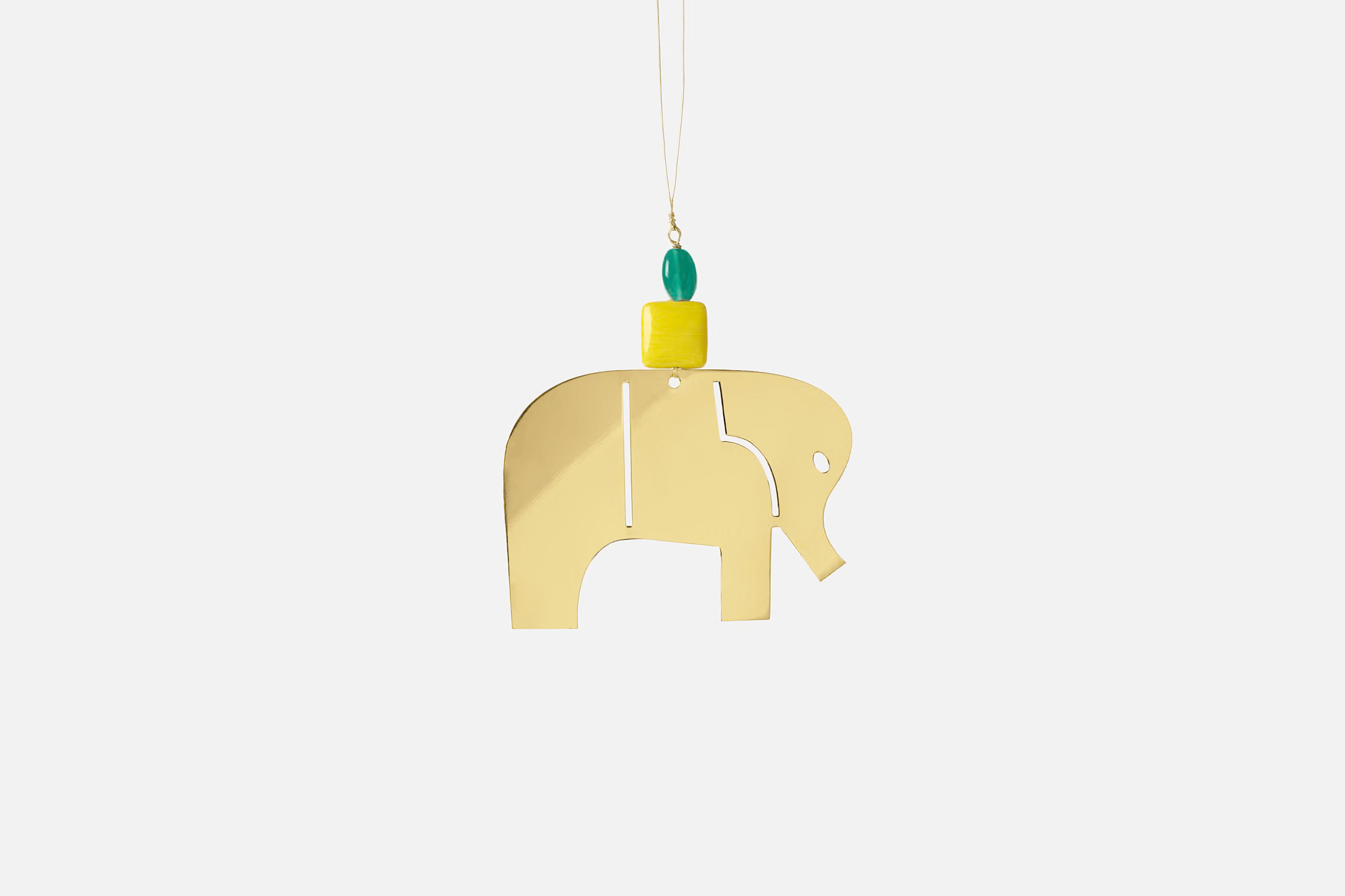 svenskt-tenn_nkuli-mlangeni-berg_decorative-accessories_ornament-love-letter_yellow__brass--glass__116300_0_vfi5er